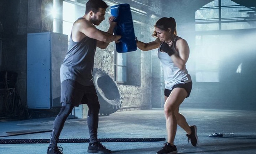 Image 1: MMA or Jiu-Jitsu: 2, 3 Group Classes or 4 Private Sessions for Two 