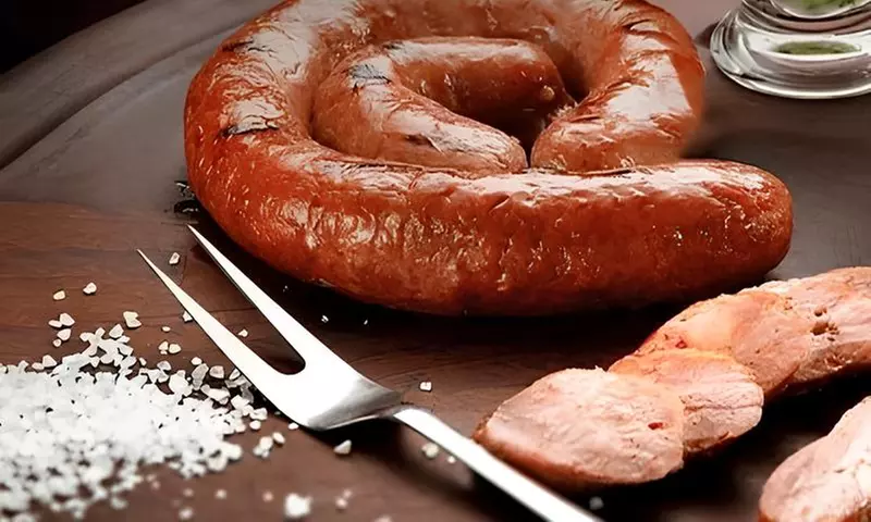 Extensive Selection of Churrasca Meats and Bottle of Wine