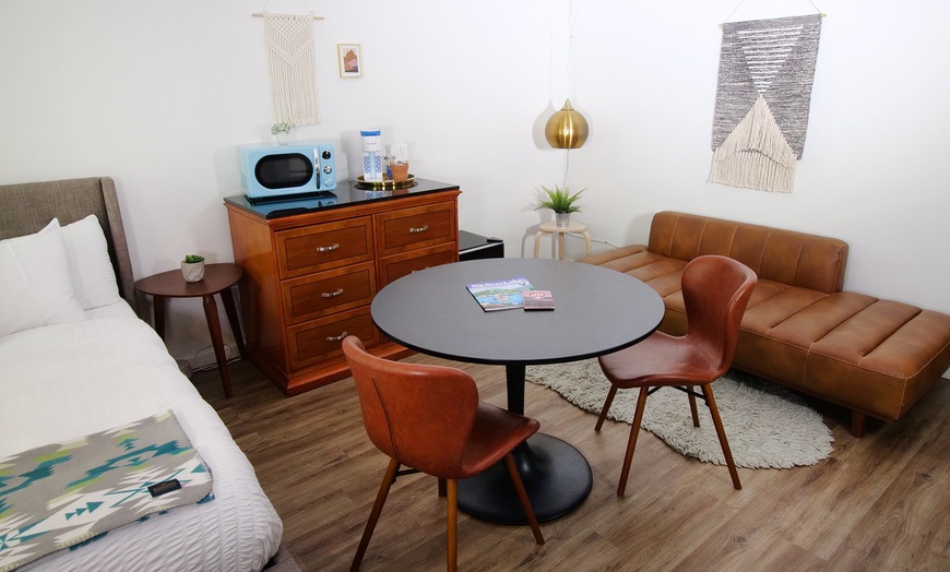 Image 11: Relax by the pool with lake views and mountain breezes