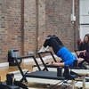 Image 4: Elevate Your Wellness Journey: 5, 10, or 20 Reformer Pilates Classes at Flowing Body Pilates (Up to 63% Off)