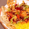 Image 2: Get $50–$150 Toward Food & Drinks at Me & Yogi Indian Kitchen
