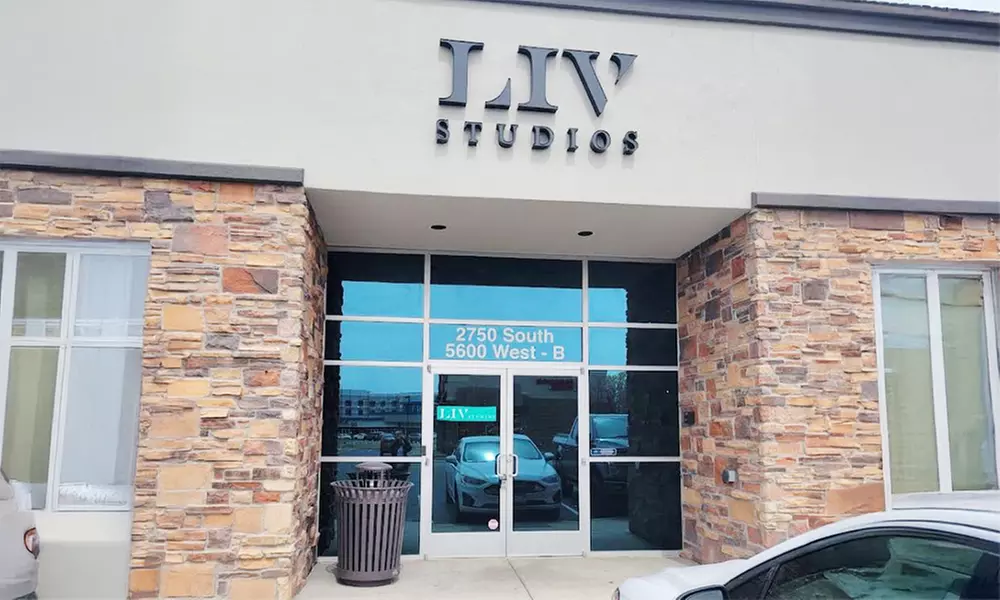 Haircut with Condition, Blow-Dry & Optional Root Touchup or Highlights