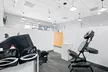 One or Two Knee Decompression Session w/ or w/o Class 4 Laser Therapy (Up to 88% Off) - Second Medium