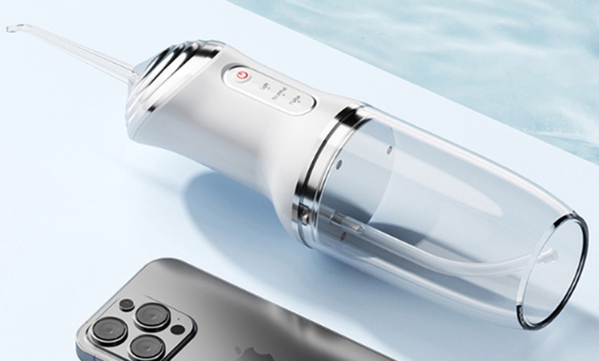 Image 6: Three Modes Electric Cordless Water Flosser for Teeth
