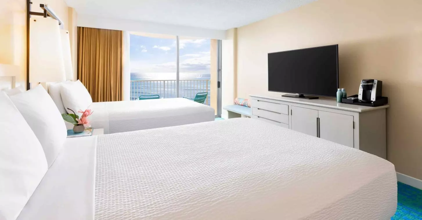 Steps from Waikiki Beach and Free Surf-Board Credits Each Day