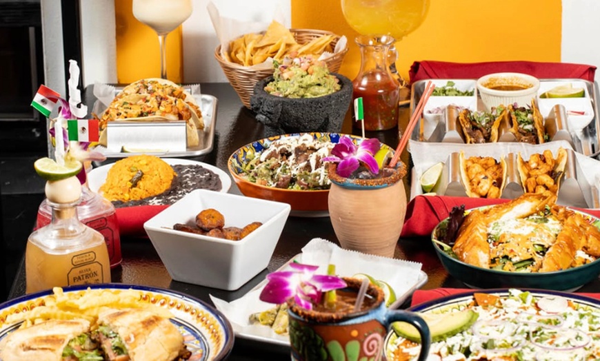 Image 23: Vibrant Rooftop Dining: Choose Meals, Margaritas, or Dining Credit