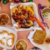 Image 1: Two Po'Boys, Meals for Two or Four With Beignets, and $50–$75 Credits