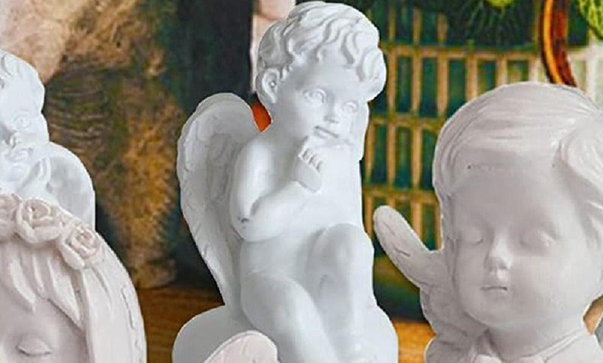 Image 14: Estatuas de ángel