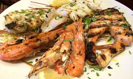 Menù con 1kg o 2kg di pesce alla griglia con bottiglia di vino per 2 o 4 persone (sconto fino a 66%)