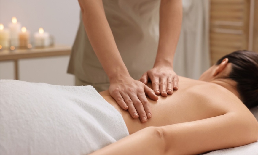 Image 1: 60, 90, or 120-Minute Deep Tissue/Swedish Massage with Hot Stones