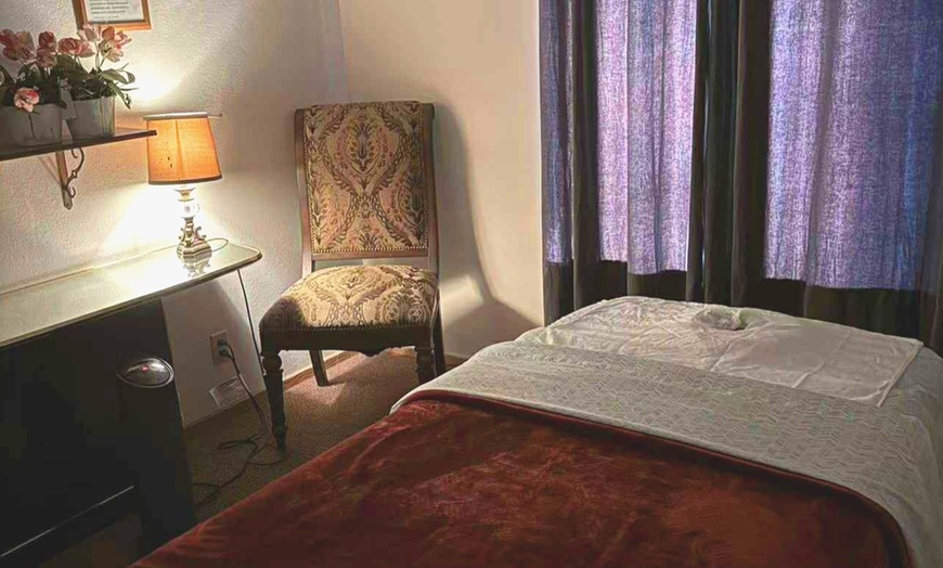 Image 7: Massages for 1 or 2 with Optional Hot Stones and CBD Oil 