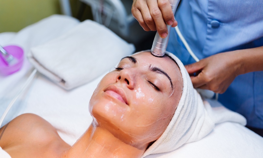 Image 1: Up to 40% Off 1 or 2 Dermaplane Glow Facials at Sugar Glow Esthetics 