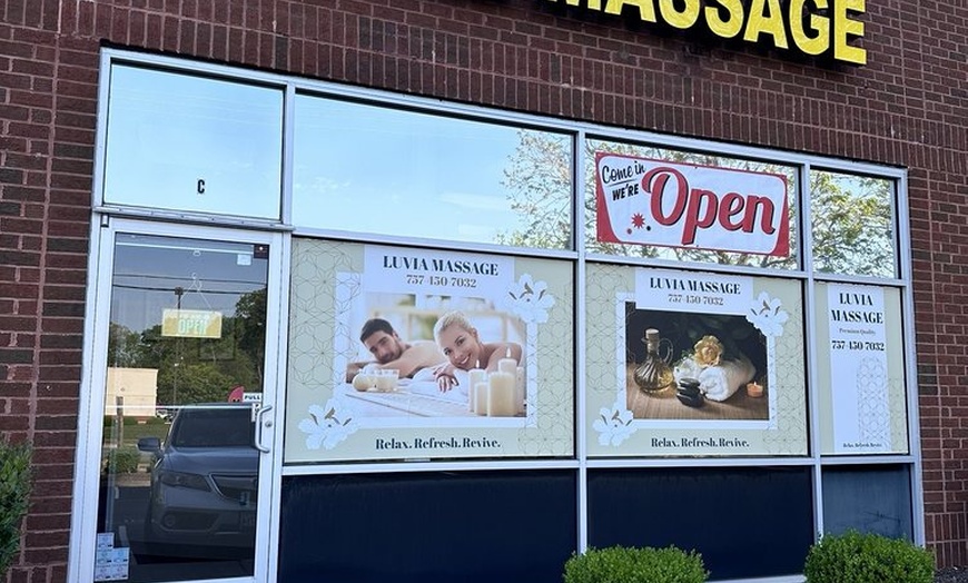 Image 13: Massages for 1 or 2 with Hot Towels, Organic Massage Oil and Lemon Tea