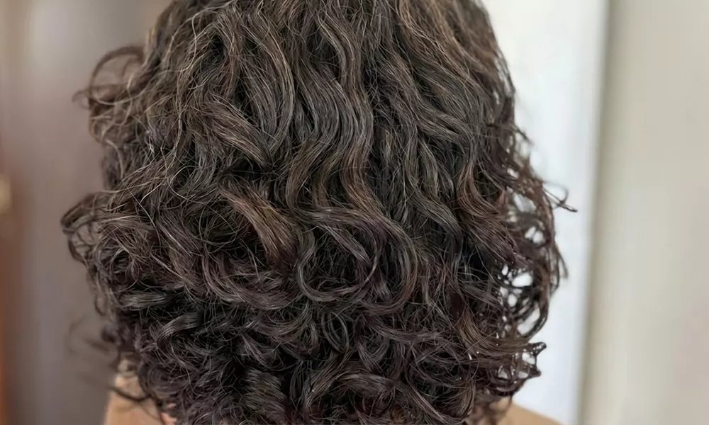 Custom Curly Cuts, Vibrant Color, & Smooth Blowouts for All Hair Types