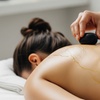 Image 1: 30, 50 or 70-Minute Hot Stone Massage with Warm Organic Oil for 1 or 2