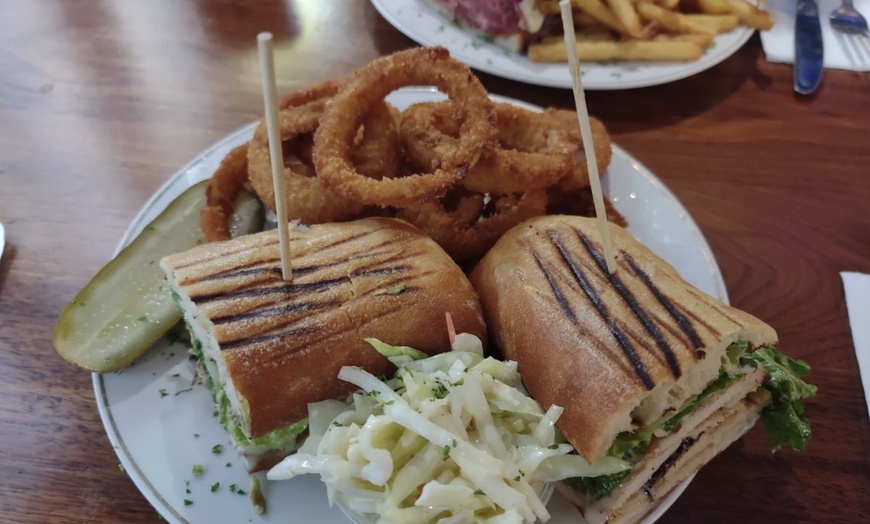Image 13: Get a $50 or $100 Dining Credit
