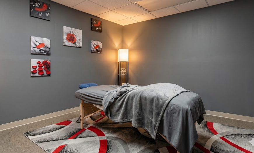 Image 2: 60-Min Swedish/Deep Tissue Massage Natural Enhancement Day Spa