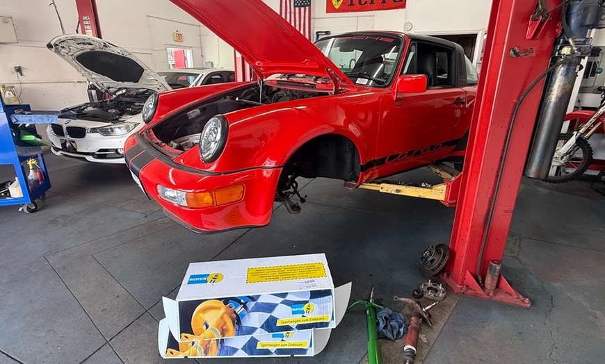 Image 3: Essential Vehicle Maintenance: Oil Changes, Brakes & Coolant Flushes