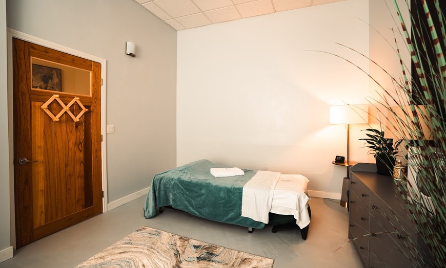 Image 2: Individual or Couples 60-Minute Massage + Hot Stone, Pad & Coconut Oil