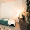 Image 2: Individual or Couples 60-Minute Massage + Hot Stone, Pad & Coconut Oil