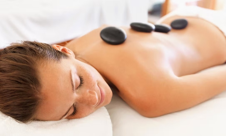 Image 2: Enjoy 60, or 90-Minute Swedish and Deep Tissue Massage with Hot Stones
