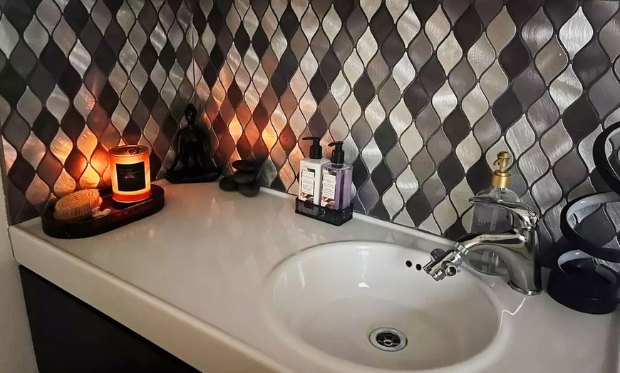 Image 3: One 60-Minute or 90-Minute Cupping or Hot Stone Massage