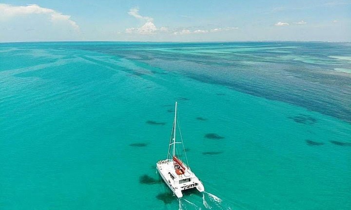 Amazing Day Trip with a Boat, Snorkeling, and Open Bar for 1, 2 or 4