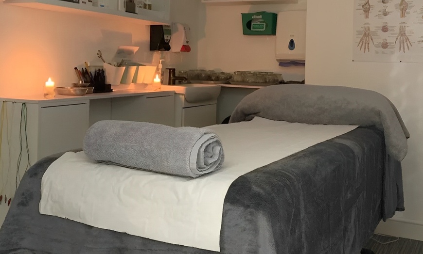 Image 1: One 25-Minute: Holistic Massage or One 45-Minute: Choice of Massage