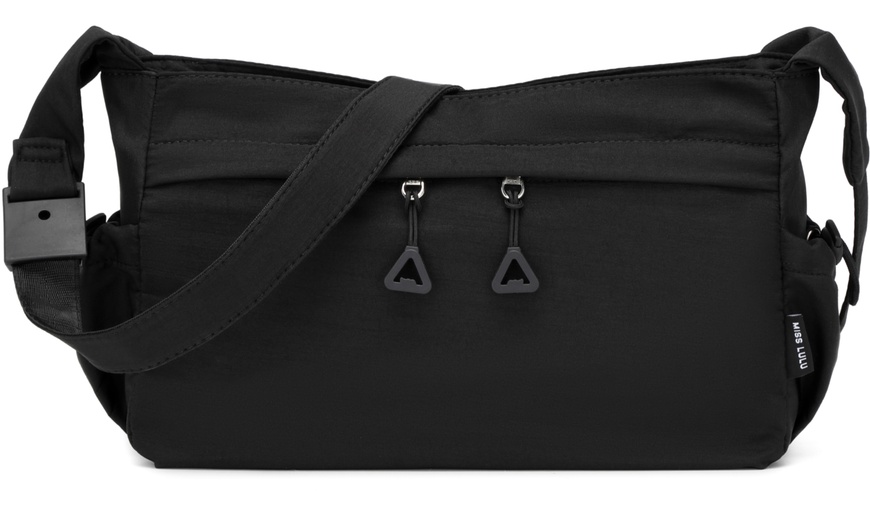 Image 2: Bandolera de estilo casual con correa ajustable y múltiples bolsillos
