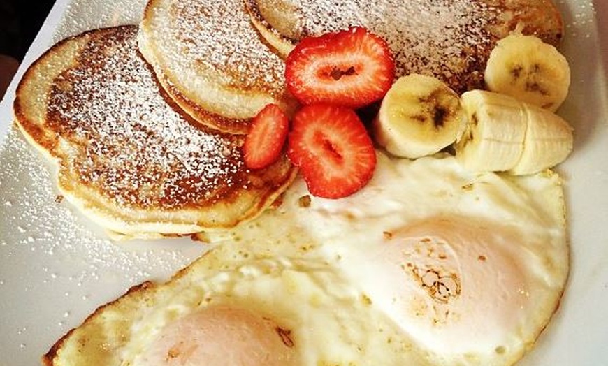 Image 3: Sunday brunch feast with entrees, drinks and shared starters