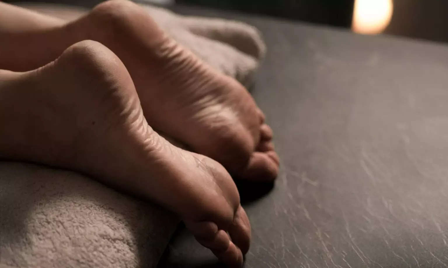 60-Min Hot Stone or Deep Tissue Massage w/ Optional 15-Min Foot Scrub