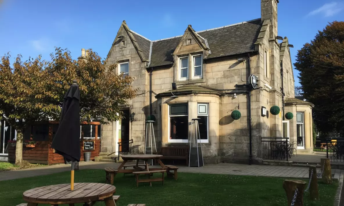 Classic Sunday Roast with a Glass of Wine for Two or Four