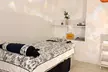 Relax w/ 60 or 90-Minute Swedish Massage and Hot Stones with Optional Reflexology at A Plus Spa (Up to 43% Off) - Second Medium