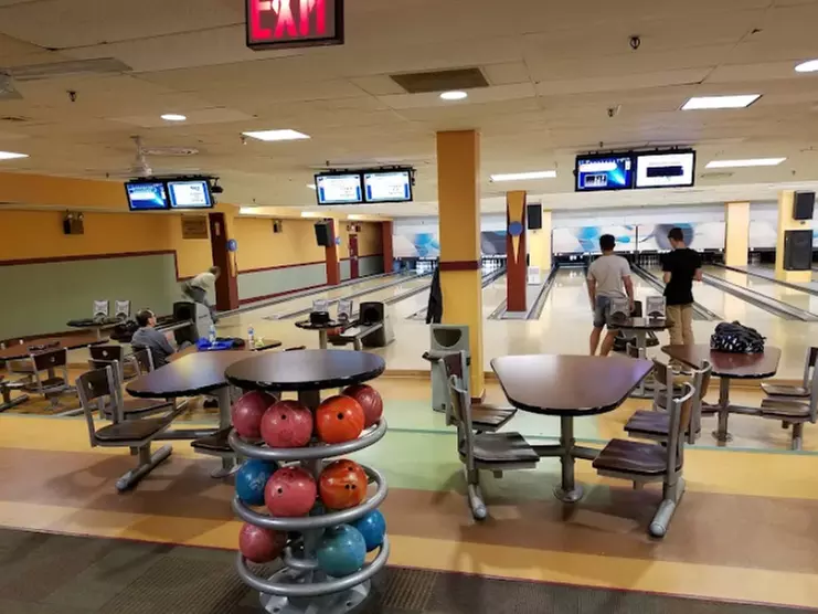 Enjoy Two Games of Bowling with Shoes for Two, Four, or Six People
