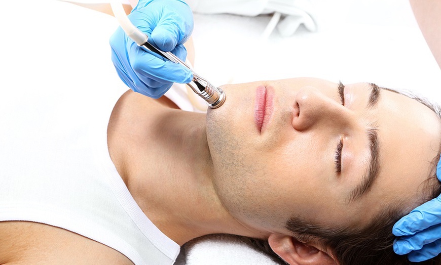 Image 5: DiamondGlow Facial or Microdermabrasion and Light Peel Combo Treatment
