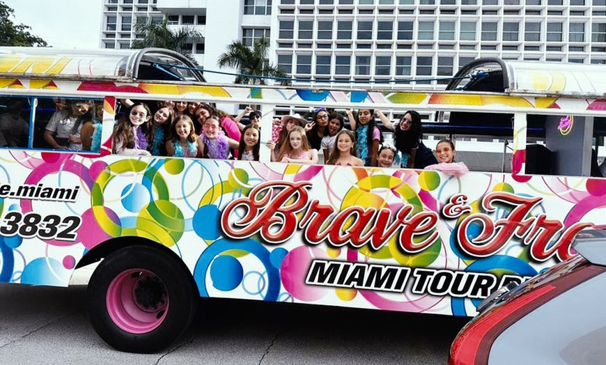 Image 2: Enjoy 1.5-Hours Open-Air Party Bus Tour with Guide & Iconic Views