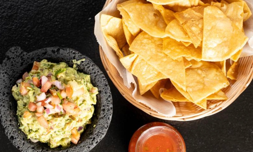 Image 3: Vibrant Rooftop Dining: Choose Meals, Margaritas, or Dining Credit