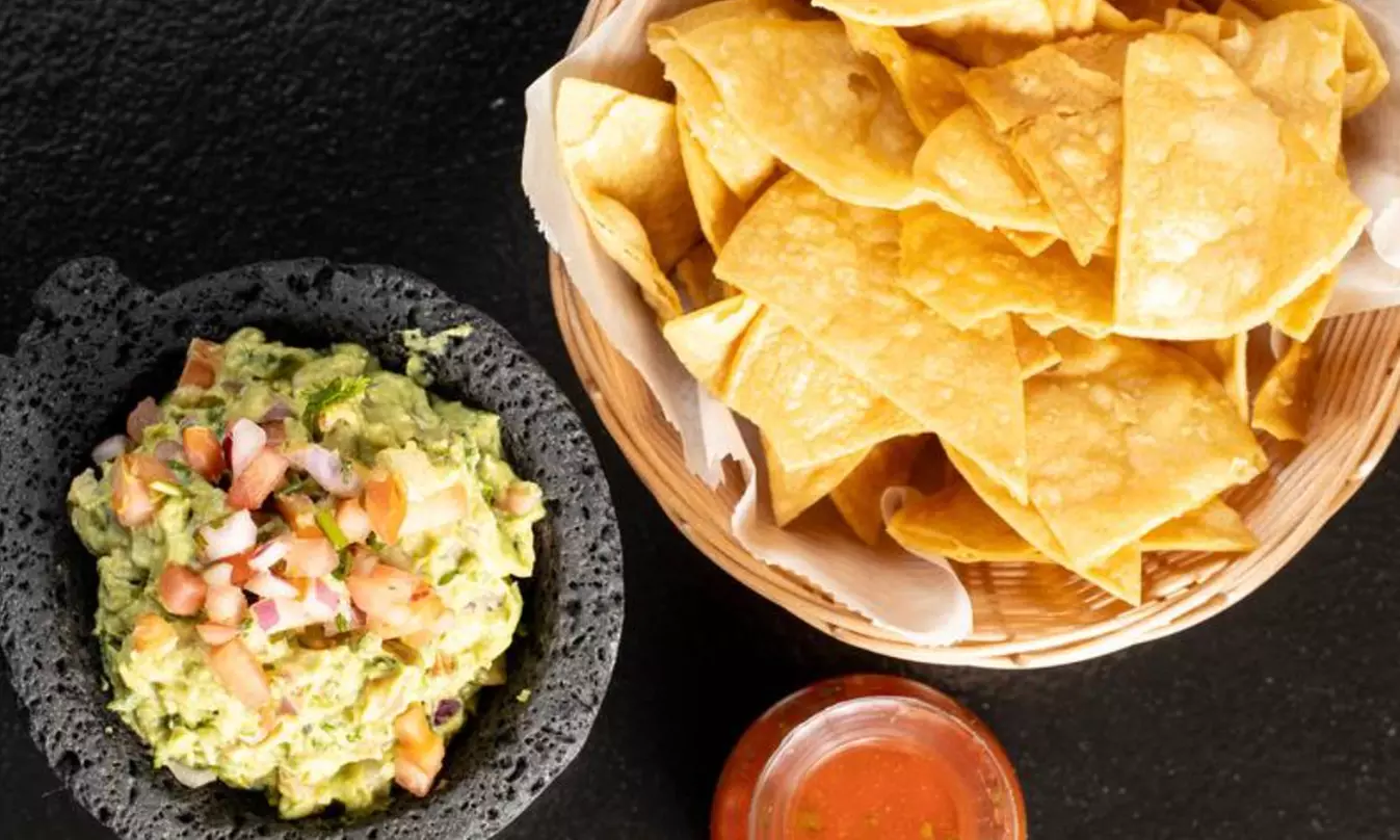 Vibrant Rooftop Dining: Choose Meals, Margaritas, or Dining Credit