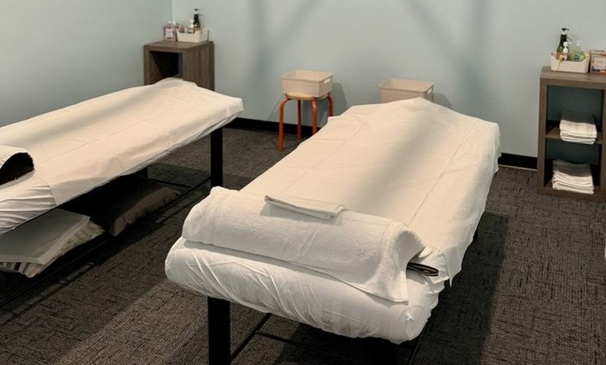 Image 1: Signature Body & Foot Combo Massages with Hot Stones for 1 or 2