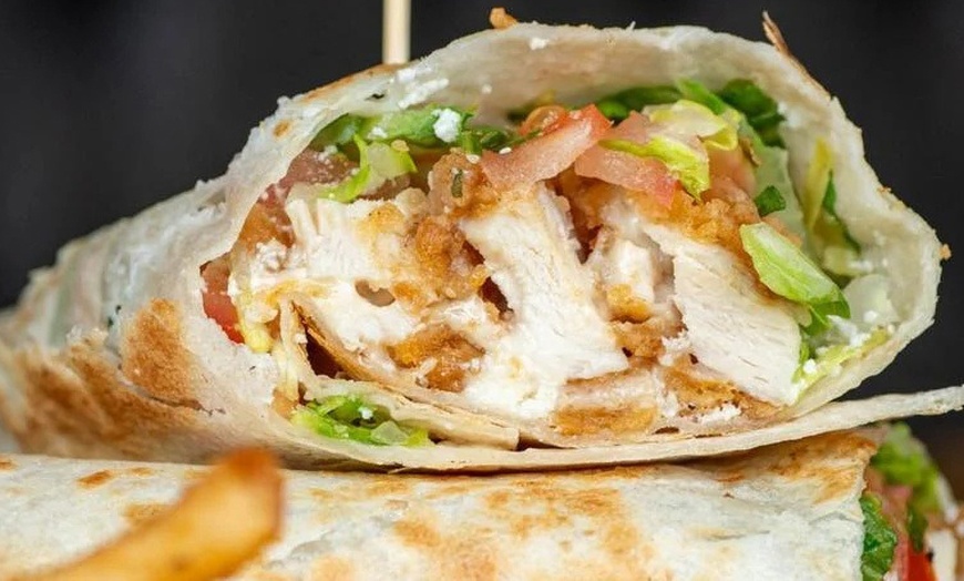 Image 8: Sip & Savor with $30 or $60 Worth of Food & Drinks at DSTRKT 