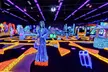 Experience 18 Holes of Indoor Blacklight Mini Golf  at Monster Mini Golf Cordova, Up to 31% Off - Second Medium