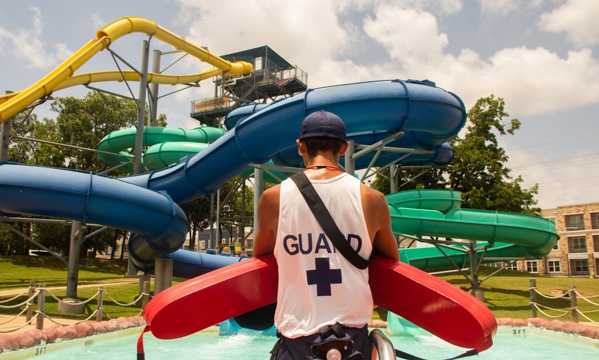 Image 8: Beat the Summer w/ 1, 2, or 4 Single Day Waterpark Admissions to Hawaiian Waters Garland