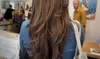 Women’s Haircut with Deep Conditioning & Blow-dry — Upgrade with Color & More at Em and Essence (Get 62% Off)