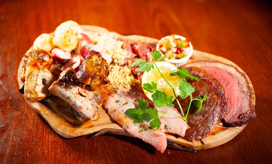 Image 1: One or Two Brazilian Meat Platter with Chips and Cocktail for 2 People