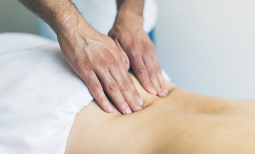 Image 1: 60 or 90 Minute Deep Tissue Massages + Hot towels