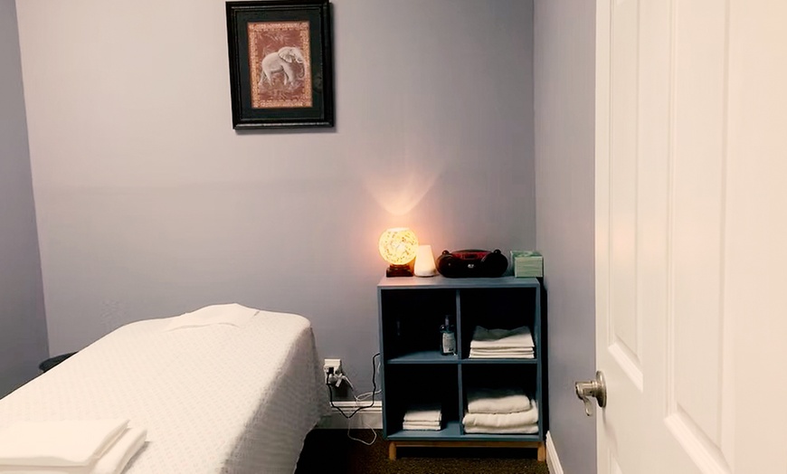 Image 2: Deep Tissue Hot Stone Massage with Walk-On-Back for One or Couples