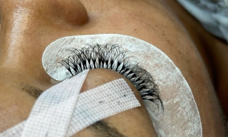 Image 2: Custom Eyelash Extensions & Sparkling Tooth Gems

