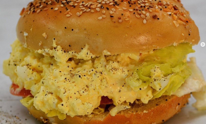 Image 2: Baked to Perfection: Fresh Bagels & Oven-Hot Pizza 