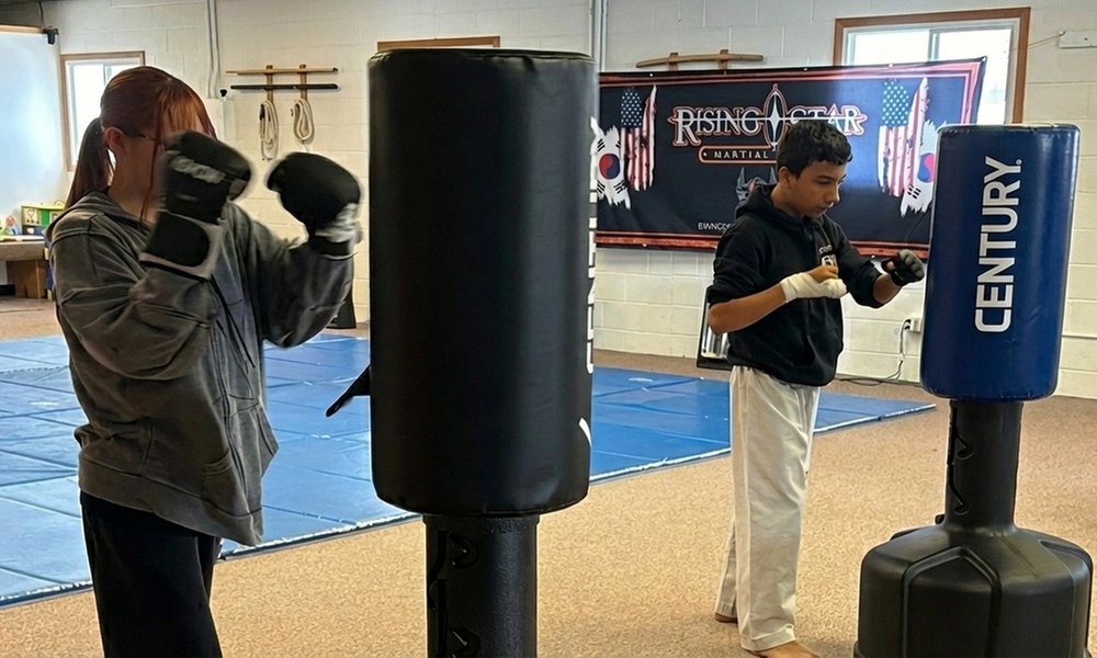 4 Weeks High-Energy Cardio Kickboxing or 12 Weeks Combat in Highland