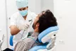 Sonríe sin preocupaciones con una limpieza dental con revisión y opción a un empaste simple en Clínica Evolución Tomares - Second Medium
